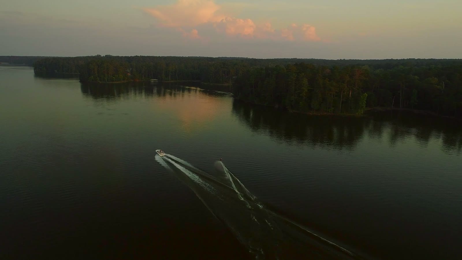 Actual aerial footage still of boating at sunset on Lake Thurmond