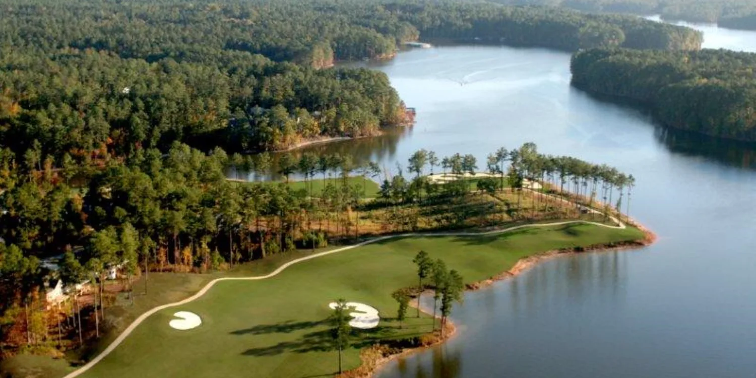 Aerial photograph of a Monticello green on a point of land with Lake Thurmond winding into the distance